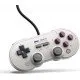 A retro-styled grey controller with purple face buttons and dual analogue sticks, inspired by classic 8-bit handheld aesthetics