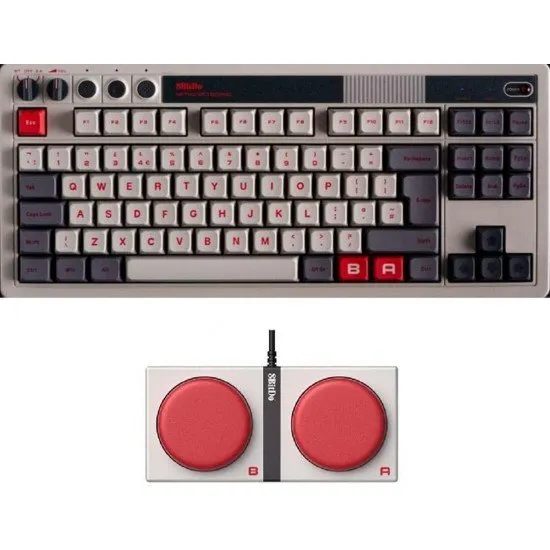A vintage-style mechanical keyboard with grey and off-white keycaps, red accents, and two oversized external arcade buttons