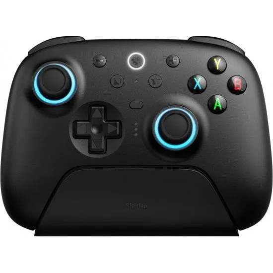 A sleek wireless gaming controller sitting on its dedicated charging dock with visible back paddles and textured grips