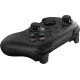 A sleek wireless gaming controller sitting on its dedicated charging dock with visible back paddles and textured grips