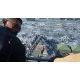 A PlayStation 5 game case depicting a sleek stealth jet accelerating upwards into the stratosphere above a highly detailed photorealistic coastline