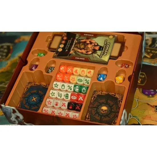 The Adventures of Conan board game box showing Conan the Barbarian in a battle stance with custom dice