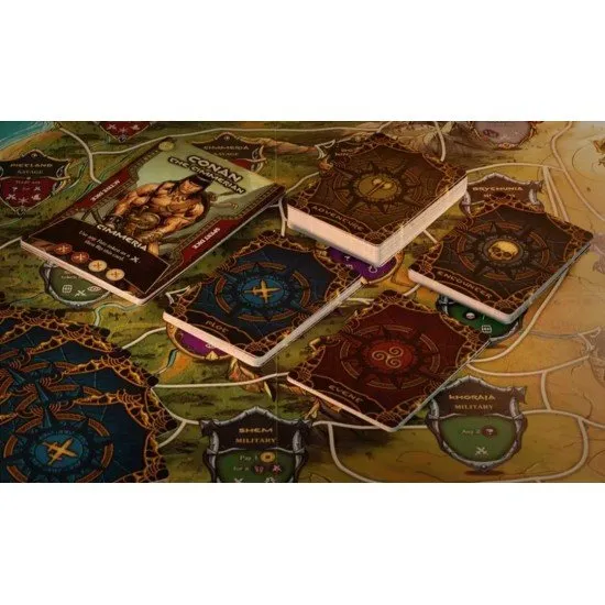 The Adventures of Conan board game box showing Conan the Barbarian in a battle stance with custom dice