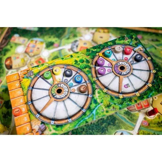 Black Forest board game box art showing a traditional German village and resource management components