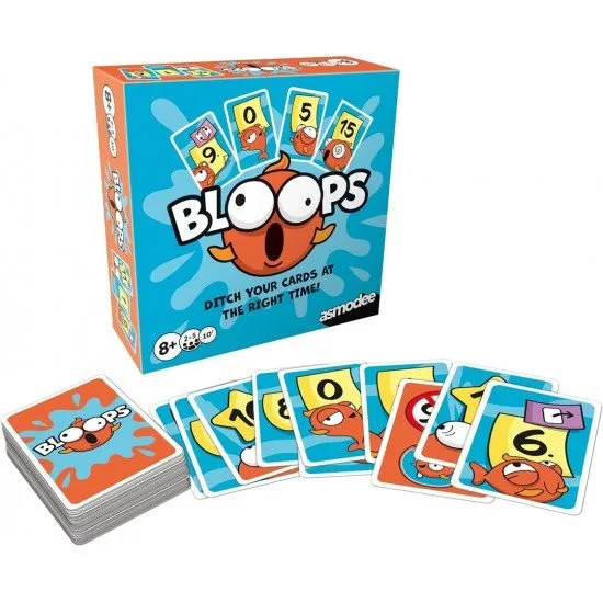A collection of colourful and whimsical cartoon-style cards from the Bloops card game spread across a tabletop