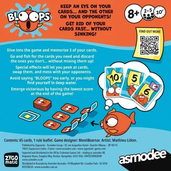 A collection of colourful and whimsical cartoon-style cards from the Bloops card game spread across a tabletop