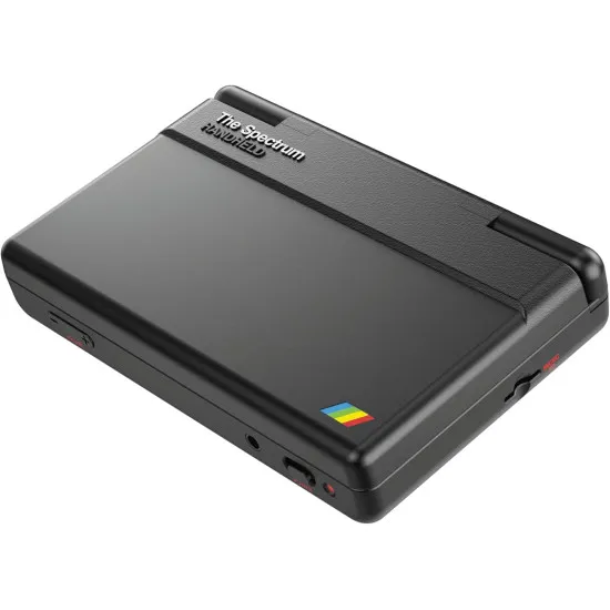 A handheld retro gaming console designed with the iconic rainbow stripe styling of the classic home computer displaying a vibrant pixel art game screen