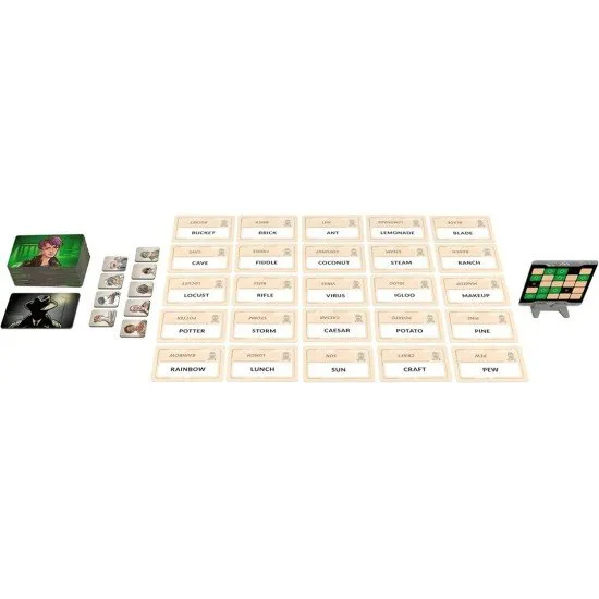 Two players sitting across from each other with a 5x5 grid of word cards and a double-sided key card in a stand