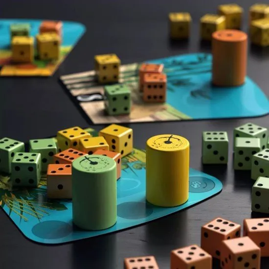 The box art for the Dandelions board game, showing dice and seeds floating over a garden landscape.