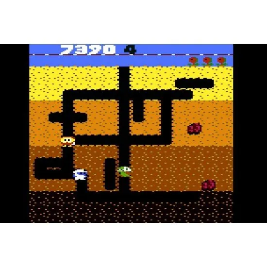Dig Dug Atari 7800 Classic Arcade Dig Dug Atari 7800 game box art showing the character Dig Dug with his air pump next to a Pooka and a Fygar in tunnels