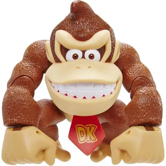 A highly detailed plastic action figure of Donkey Kong smiling and flexing his muscles inside a red and white Nintendo-themed window box packaging