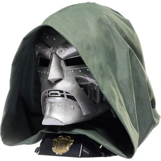 Full-head silver Doctor Doom mask with green fabric hood on a character-themed display stand