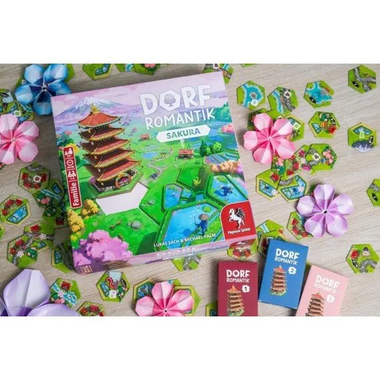 Dorfromantik Sakura Tile-Laying Game Pegasus Spiele Dorfromantik Sakura board game box art showing beautiful, harmonious tile-laid landscapes of rural Japan with cherry blossom (Sakura) trees