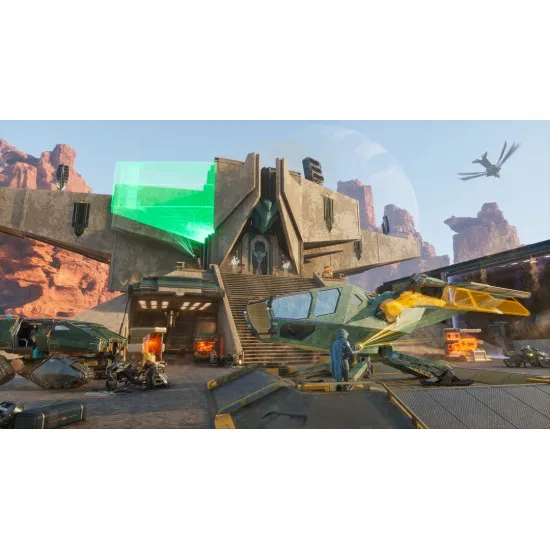 A PlayStation 5 game case depicting a lone desert survivor staring up at a colossal sandworm erupting from the rolling sand dunes of Arrakis