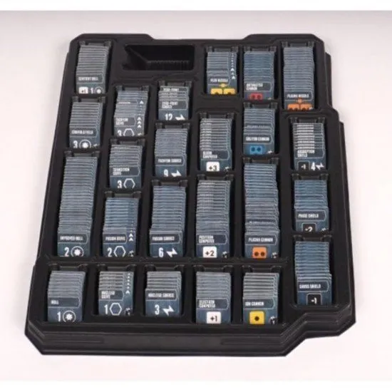 A premium board game layout featuring hexagonal star system tiles, plastic miniatures, and custom player mats