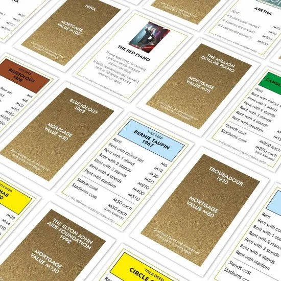 Monopoly Elton John edition board game showing the unique artwork and custom metal tokens