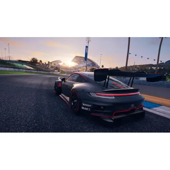 An Xbox Series X racing game case showing a high-speed Porsche Hypercar and a GT sports car tearing down a rain-slicked straight at Le Mans under dramatic skies