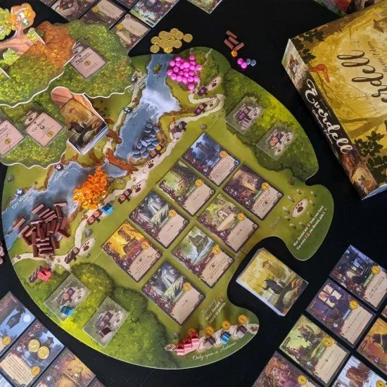 Everdell Collector's Edition 3rd Edition board game components showing the 3D Ever Tree, metal tokens, and beautifully illustrated critter and building cards