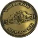 Metal Nuka-cade token replica with embossed lettering and star design
