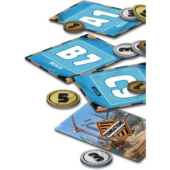 Colourful polyomino building tiles arranged on a city grid with property deed cards and prestige tokens