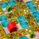 Box art for Frosted Blooms board game showing vibrant tulip fields and windmills under a soft spring sky