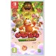 A Nintendo Switch game case featuring Garfield dressed as a cowboy swinging a lasso over a canyon filled with running candy corn characters