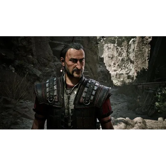 A protagonist standing on a cliff edge overlooking a vast mining camp with medieval structures