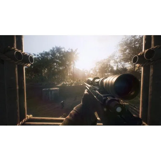 Soldiers in olive drab uniforms moving through thick green jungle undergrowth with a Huey helicopter hovering overhead