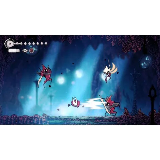 A PlayStation 5 game case showcasing a detailed fantasy setting with Hornet standing victoriously atop a ruined bell tower under a dramatic, crimson-lit sky