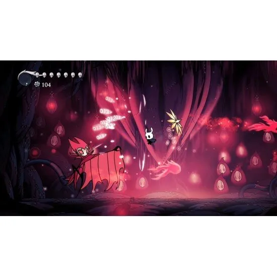 A PlayStation 5 game case showing the iconic small Knight holding a nail weapon under a glowing blue cavern background with crumbling ancient ruins