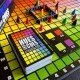 The box art for the Hues and Cues board game, featuring a colorful grid of hues with game pieces on it.