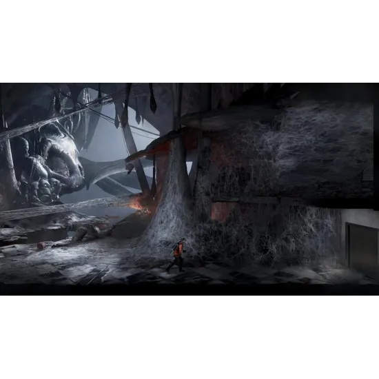 A Nintendo Switch game case showing a giant silhouette of Kong roaring amidst burning city skyscrapers while a lone man searches through the ruins below