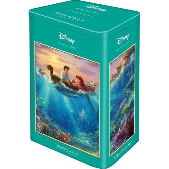 Disney The Little Mermaid 500 Piece Puzzle Thomas Kinkade The box art for The Little Mermaid 500-piece jigsaw puzzle by Thomas Kinkade, showing Ariel, Flounder, and Sebastian in the "Painter of Light" style.