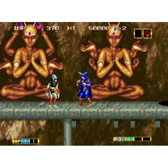 Elta the sorcerer unleashing magical energy against a backdrop of dark, gothic architecture and monstrous creatures
