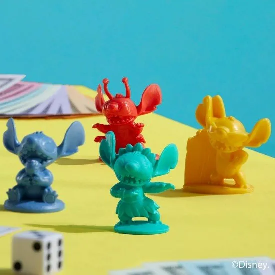 The box art for the Monopoly Disney Stitch Edition board game, showing Stitch and other characters on the themed game board with custom tokens.