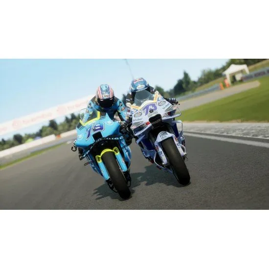 MotoGP 26 Day One Edition PS5 cover showing riders leaning into a turn on a sunlit track