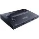 The sleek black NEOGEO AES+ console alongside its signature arcade-grade joystick controller