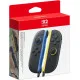 A retail box showing a pair of sleek Blue and Light Yellow Nintendo Switch 2 Joy-Con controllers equipped with matching dark grey safety straps