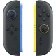 A retail box showing a pair of sleek Blue and Light Yellow Nintendo Switch 2 Joy-Con controllers equipped with matching dark grey safety straps