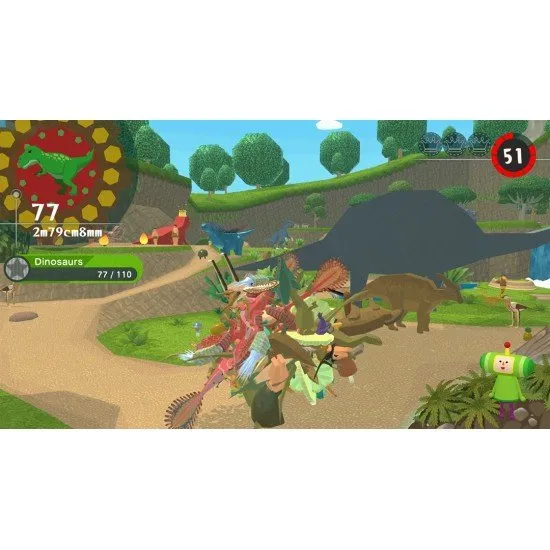 Once Upon a Katamari Switch box art showing The Prince of All Cosmos rolling a giant Katamari ball over various historical landscapes (Jurassic, Ice Age, Japan)