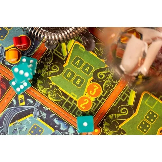 Piña Coladice game box showing a vibrant tropical beach scene with dice and cocktails