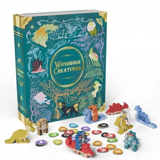 Wondrous Creatures board game box showing fantasy artwork, hexagonal puzzle board, and creature cards