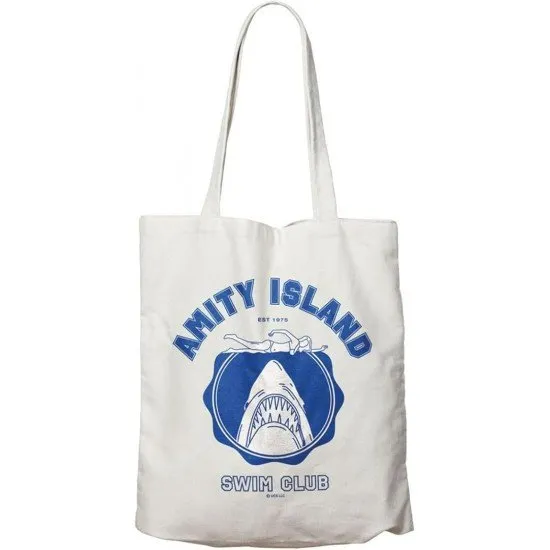 Cream cotton tote bag featuring the Amity Island Swim Club logo and the Great White Shark silhouette