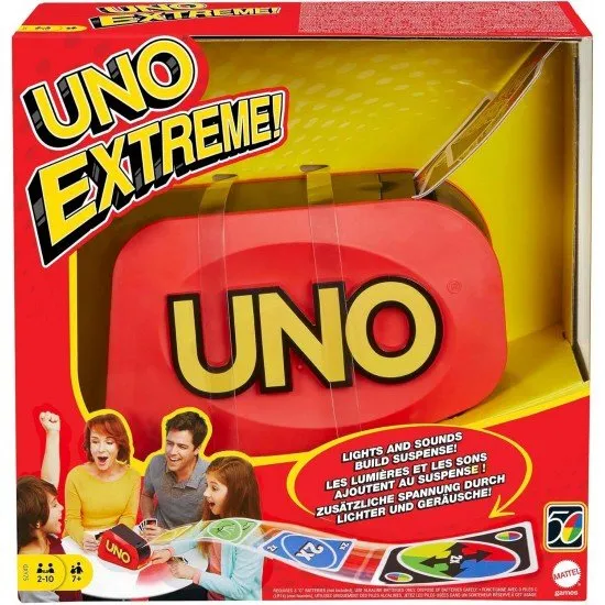 A group of friends laughing as the UNO Extreme launcher shoots several cards into the air