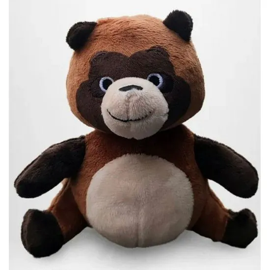 Small plush toy of Shokichi the tanuki with brown fur and a traditional Japanese leaf on his head