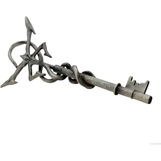 Metal replica of the Insignia Key from Resident Evil 4 featuring the Los Iluminados emblem