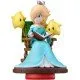 An amiibo figure of Rosalina in her blue dress reading a storybook with two small Lumas beside her