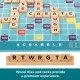 A double-sided Scrabble board showing the classic grid on one side and the colourful Scrabble Together layout on the other