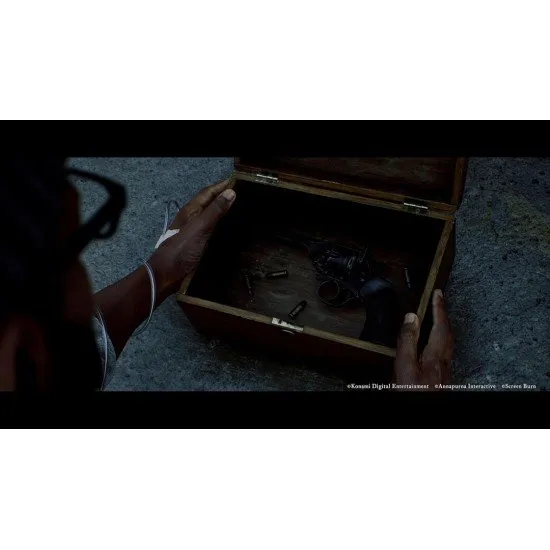 Simon Ordell holding a pocket television while standing in a heavy fog on a Scottish island