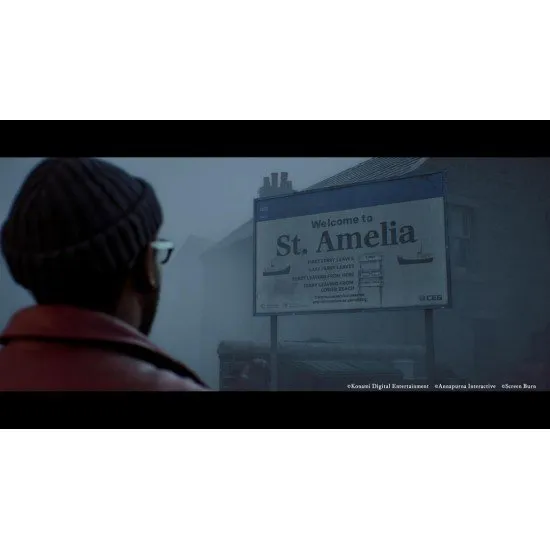 Simon Ordell holding a pocket television while standing in a heavy fog on a Scottish island